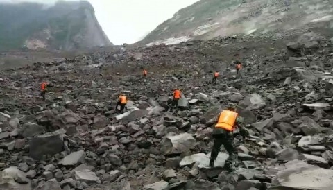 China landslide leaves at least 140 missing 