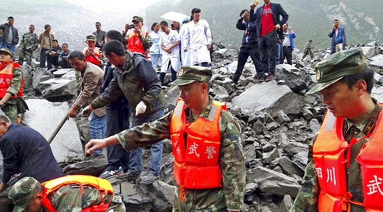 15 bodies found after landslide buries scores in China