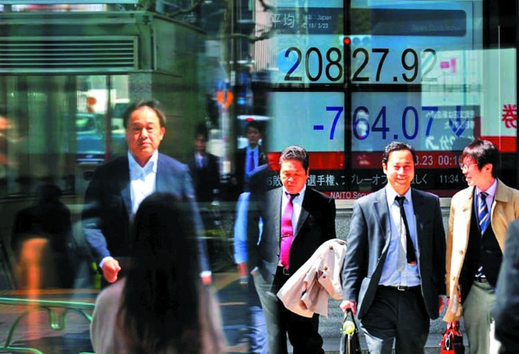 Strong dollar hits Asian share markets