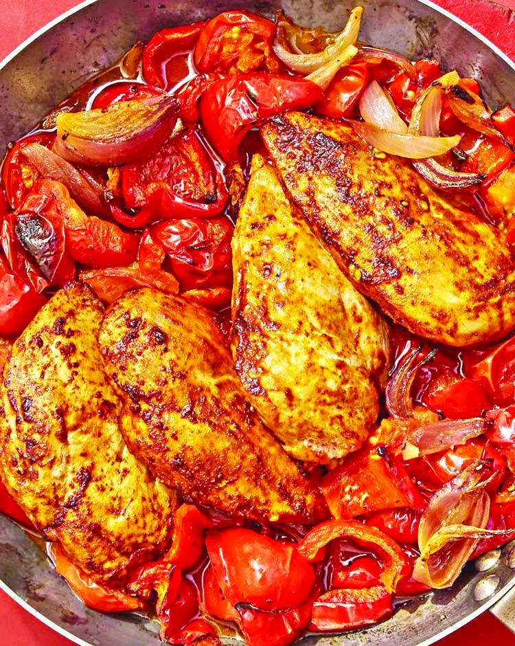 Chicken with stewed peppers and tomatoes