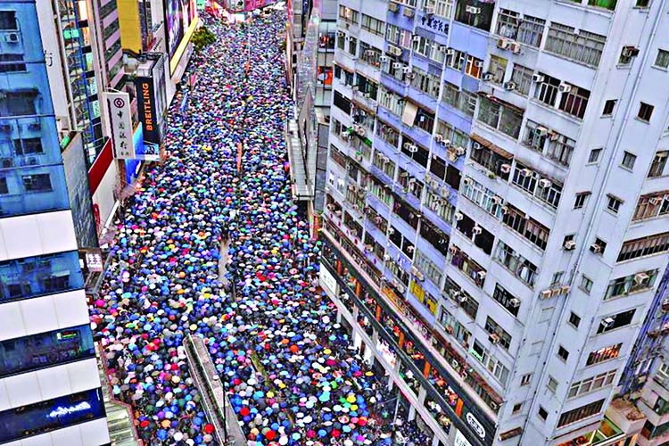 Hong Kong leader hopes peaceful rally presages 'return to calm'