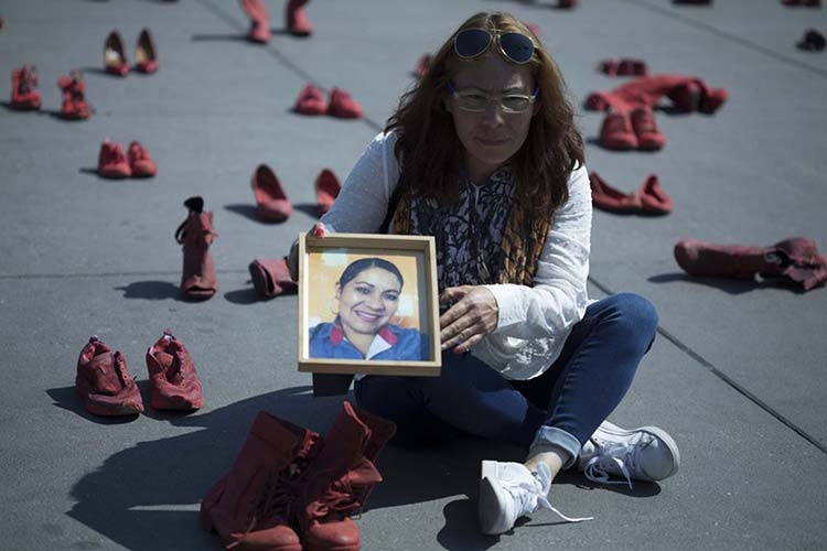 In Mexico City, red shoes to protest killings of women