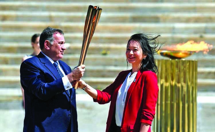 Greece hands over Olympic flame to Tokyo 2020