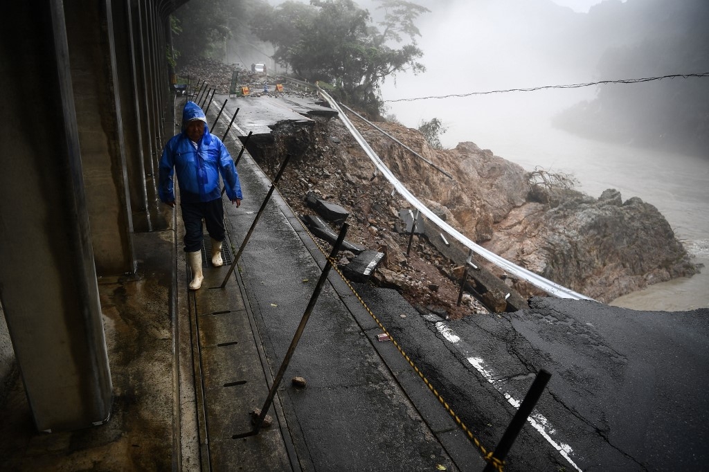 Japan issues fresh rain disaster warnings as death toll hits 54