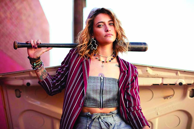 Paris wears heart on her sleeve in debut solo album