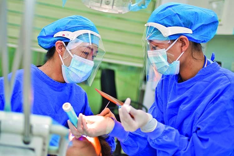 Thai hospitals suspend testing amid new Covid-19 outbreak