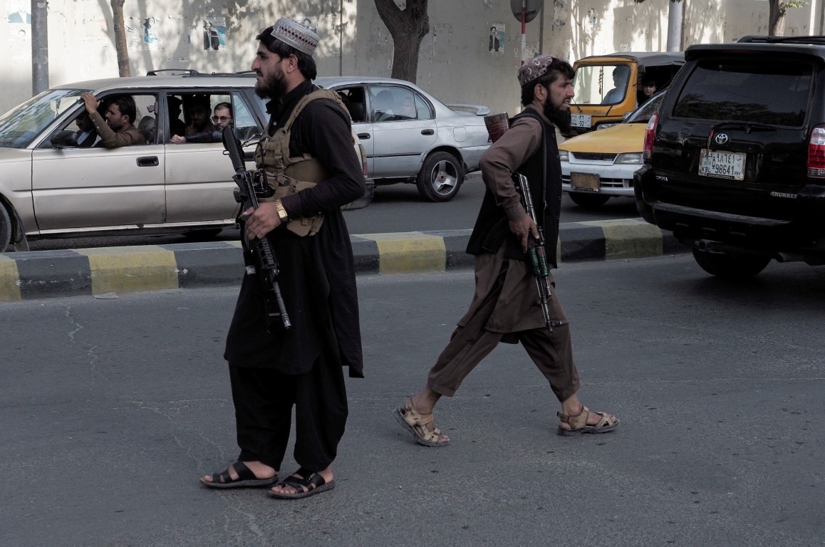 Taliban hang bodies as warning in Afghan city