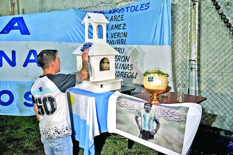 Unusual 'church' honors late football star Maradona