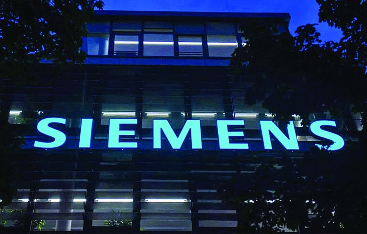 Siemens profits down as it plans Russia exit