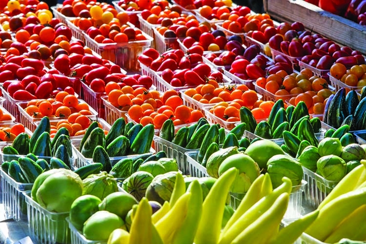 Summer vegetables appear abundantly in markets