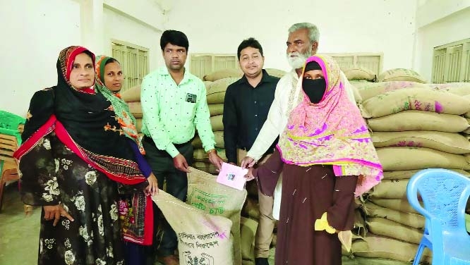 Rice distributed among poor women in Jhenaigati