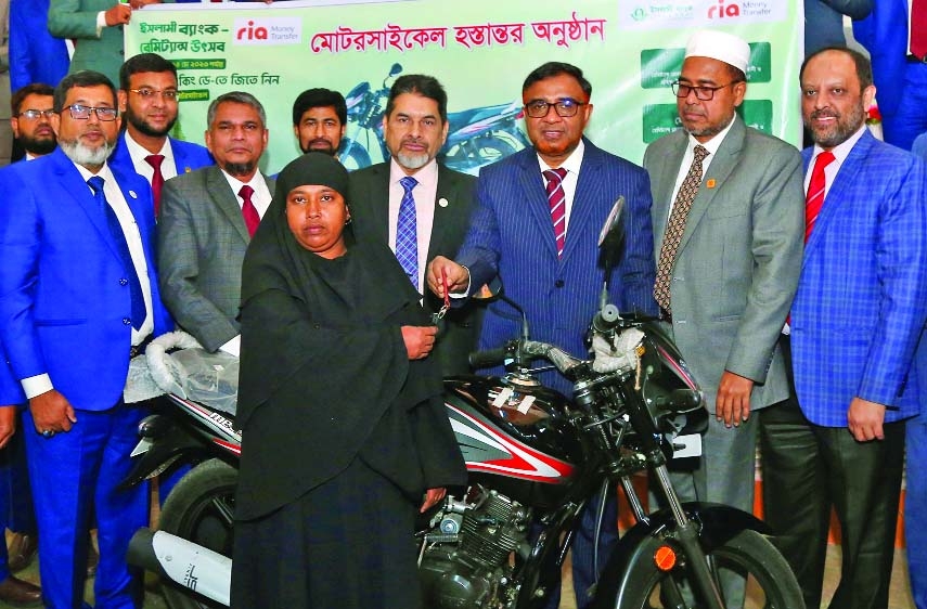 IBBL, Ria Money hand over motorcycle to winner 