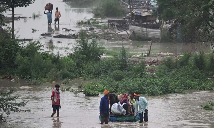At least 41 dead after heavy rain and flash floods in northern India ...