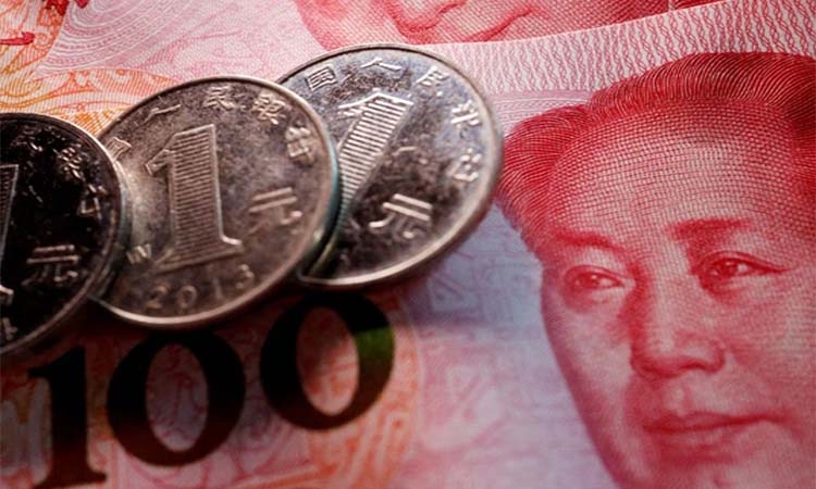 State banks of China selling dollars offshore to slow yuan declines, sources say