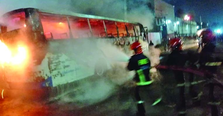 Bus set  on fire  in Dhaka's Tejgaon