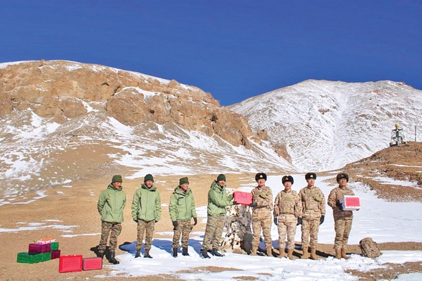 Indian and Chinese troops gift sweets at contested border | The Asian ...