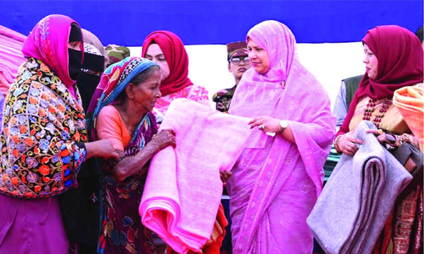 Sena Paribar Kalyan Samity distributes winter clothes among poor