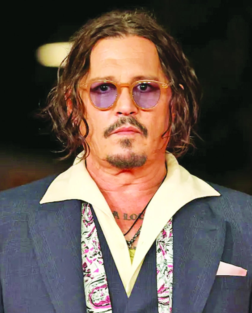 Johnny Depp reflects on raising kids outside Hollywood