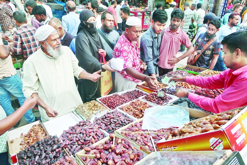 As Ramadan edges closer, the hustle and bustle seen at date market