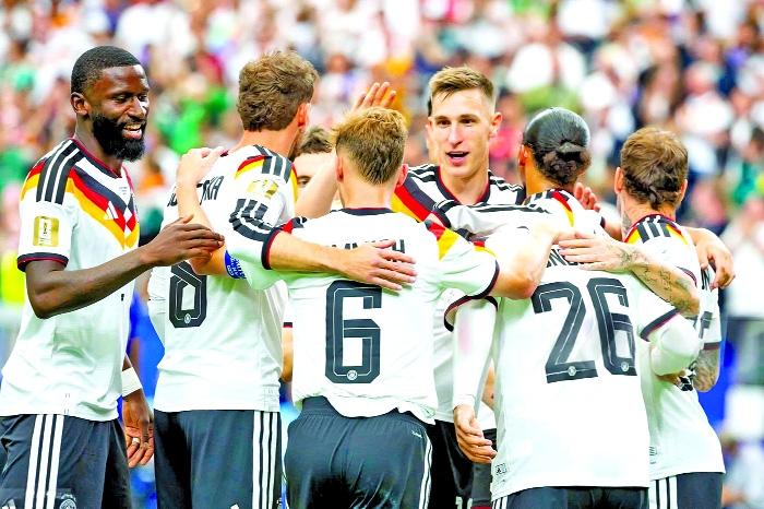 Germany crush Curacao, Japan thwart Dutch at World Cup 