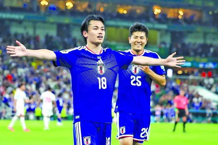Ueda shines as Japan knocks out Tunisia in World Cup's 1,000th game