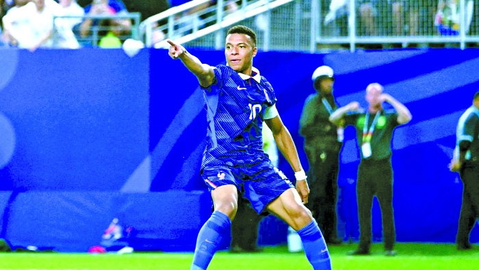 Mbappe scores twice as France beat Iraq at World Cup after two-hour storm delay   