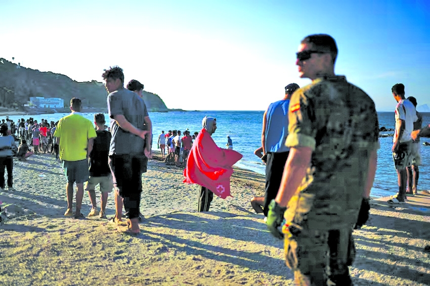 Spain's Ceuta overwhelmed as thousands remain after migrant border rush