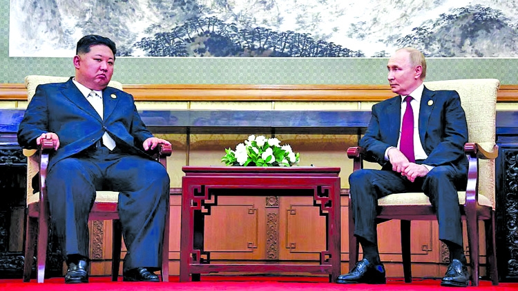 Kim vows to expand ties with Russia, backs victory in 'sacred war'