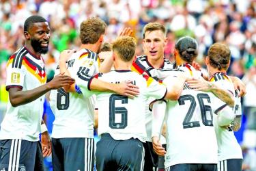 Germany crush Curacao, Japan thwart Dutch at World Cup 