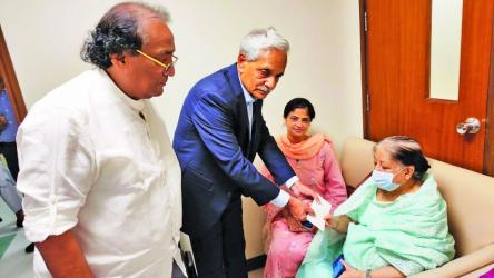 Cultural affairs minister, state minister visit ailing artist Mustafa Monwar