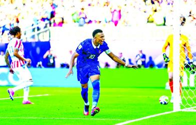 France battle past Paraguay to set up Morocco World Cup showdown