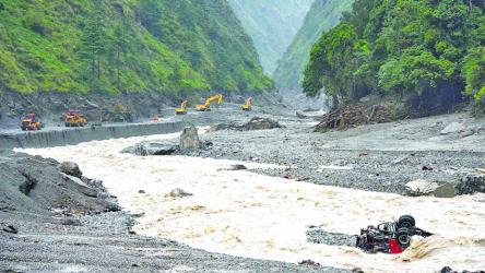 Nepal struggles to store, identify bodies carried downstream by devastating flood