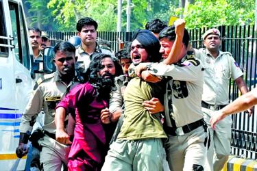 India cracks down on youth protests as anger grows against Modi