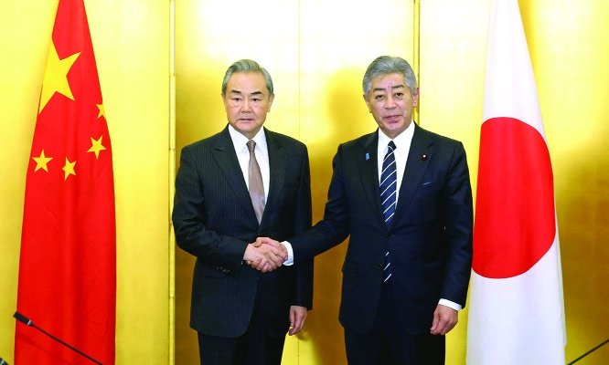 Wang Yi urges China and Japan to build constructive and stable ties