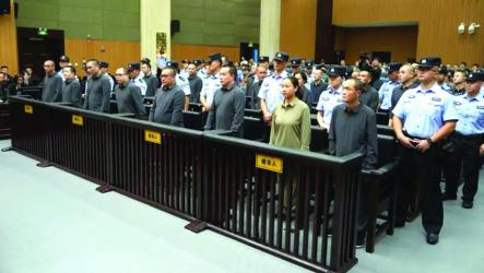 China sentences 11 members of mafia family to death 