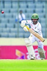 Shanto, Mominul fifties bolster Bangladesh as rain truncates day